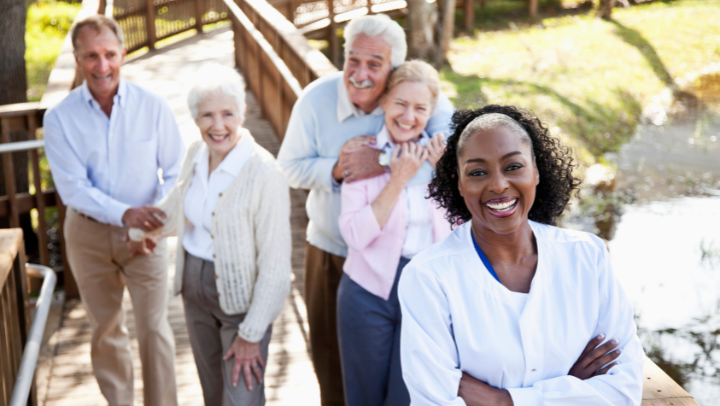 a nurse from an assisted living community with a group of seniors 