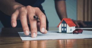 a person planning in a paper with a pen
