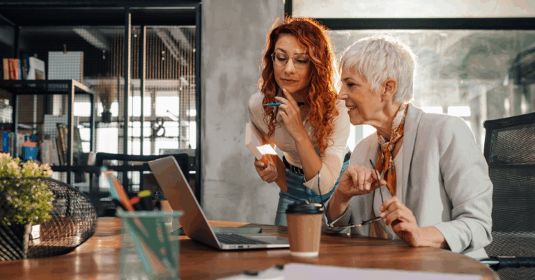 Proven Local Marketing Strategies to Boost Your Resident Count 2 people looking a computer