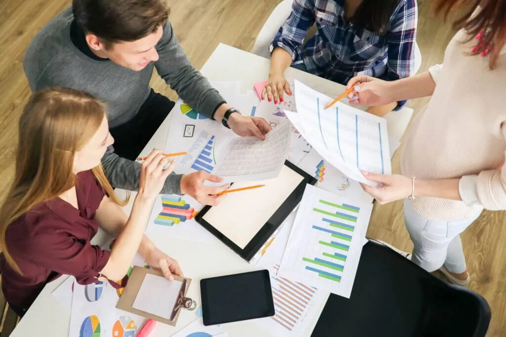 People Analyzing Metrics Information